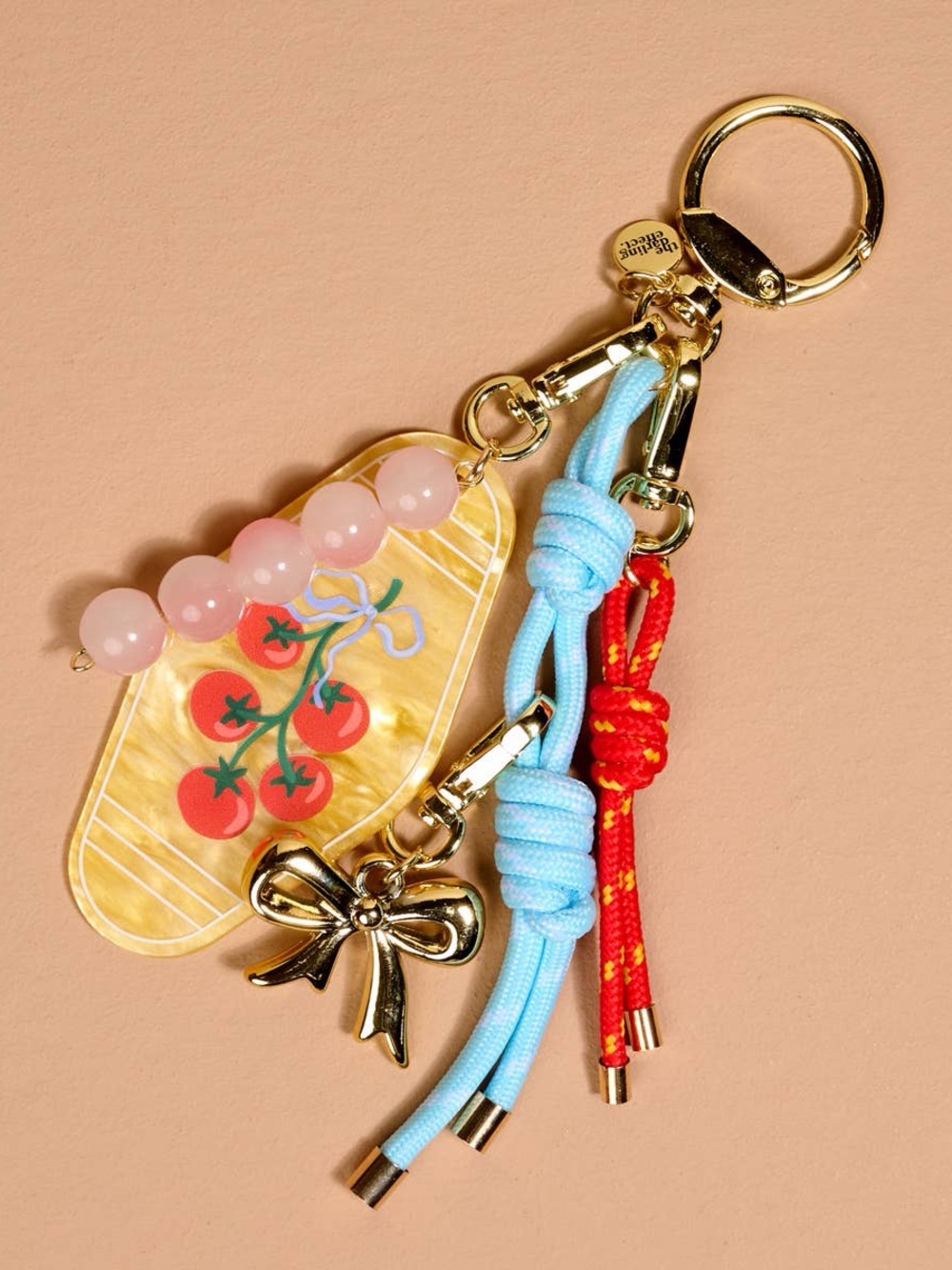 Gold Bow & Cherry Acrylic Keychain with Pink Beads and Blue & Red Cord Accents